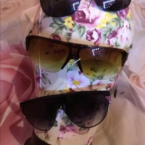 Three pairs of women’s sunglasses
